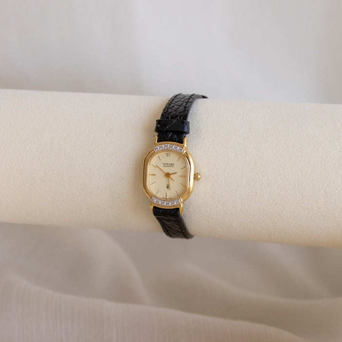 Vintage Sunlord Pave Black Strap Watch